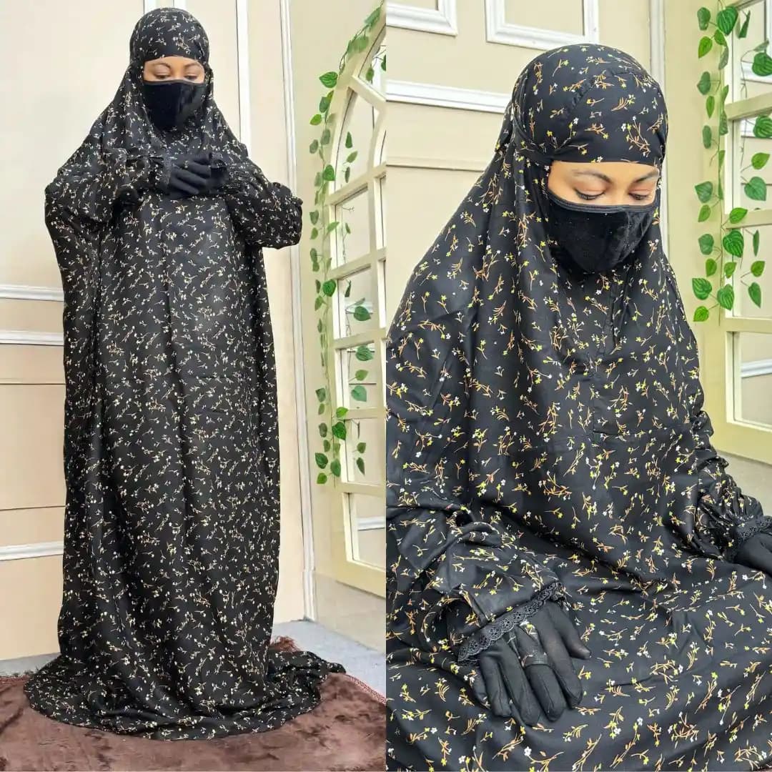 Salat long khimar in black and golden yellow floral print, modest and comfortable prayer wear for women