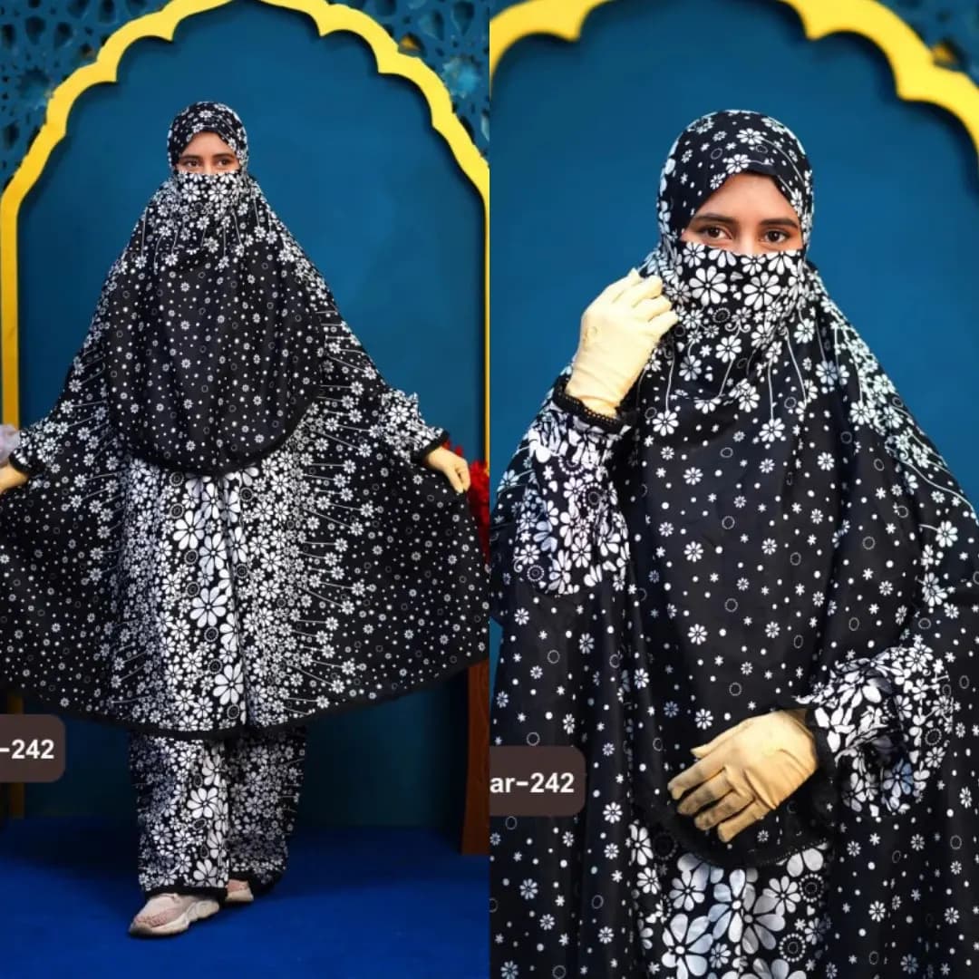 Black and white mixed floral print plazu khimar set with matching palazzo pants, full coverage modest Islamic outfit for women.