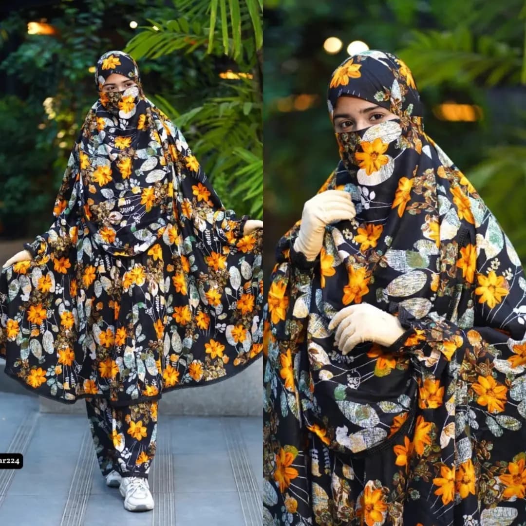 Black and orange blossom floral print plazu khimar set with matching palazzo pants, modest full coverage Islamic outfit for women.